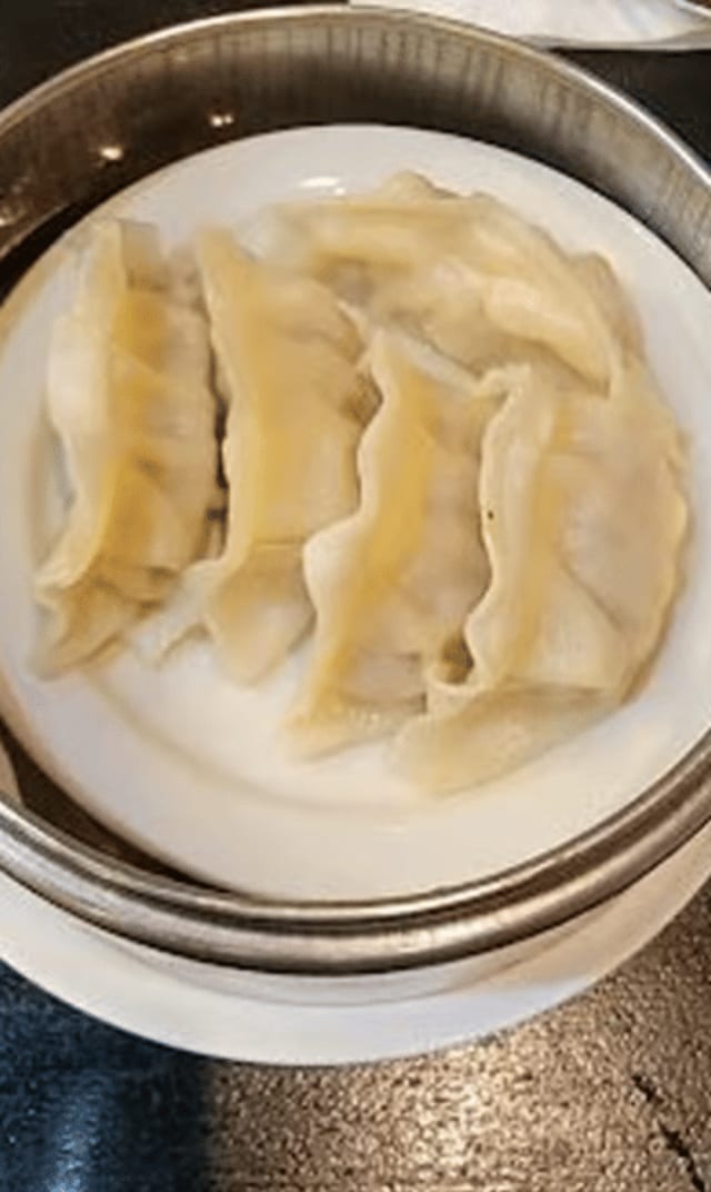Steamed Pot Stickers (9pcs).